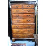 A George III mahogany chest on chest, the dentil moulded cornice over two short and six long