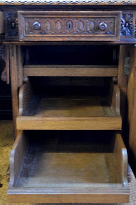 A 19th century Flemish oak pedestal desk, the wide cross-banded top with moulded edge over three - Image 5 of 7