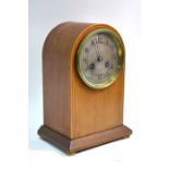 A 19th century French strung mahogany mantel clock with domed top, drum movement striking on a