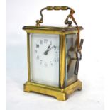 A French lacquered brass carriage clock, the 8-day movement with white enamelled dial, 11 cm h to/