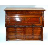 A late 19th century table top walnut cylinder dentists instrument cabinet, the interior with