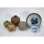 Six Asian wares, comprising: a Chinese blue and white teabowl; a provincial underglaze blue