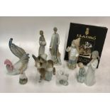 A collection of Lladro comprising:  Large cockerel, c. 1960's, 23 cm high; Boy with donkey, 20.5