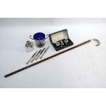 A silver-handled walking stick London 1921, to/w a cased condiment set, Birmingham 1937, four tea