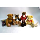 A modern Steiff teddy bear with growl-box, 38 cm to/w two Steiff rabbits, a 'Bear Essentials' (