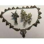A small quantity of marcasite set jewellery including brooches, maple-leaf necklace etc