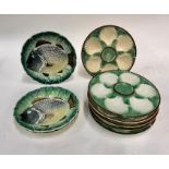 Six French majolica Oyster plates, 24 cm diam. to/w three French majolica leaf plates with fish