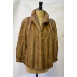 A shadowed light brown mink jacket with neat collar and shaped sleeves into cuffs, 51 cm across