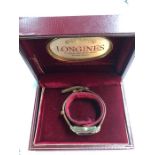A vintage Longines boxed 14k wristwatch with diamond-set rectangular champagne dial with rows of