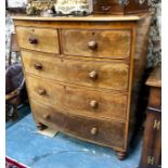 A 19th century mahogany bow front chest of two short over three long graduated drawers with turned