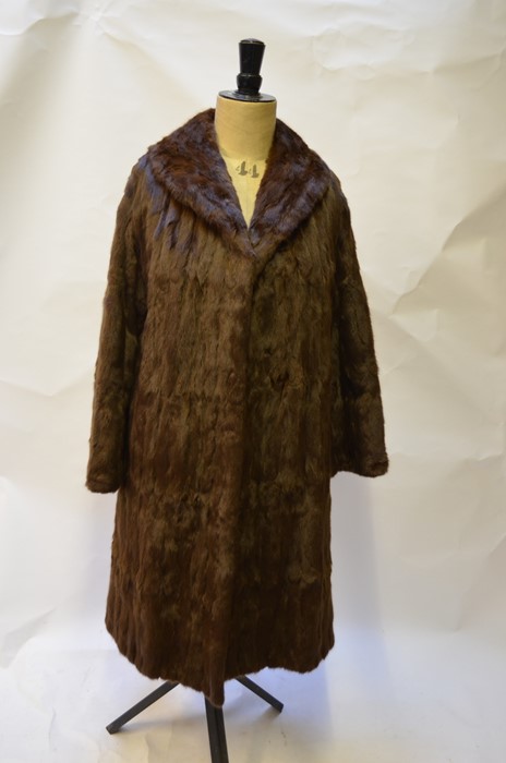 A lady's squirrel fur coat with brown satin lining, 52 cm across chestGood worn condition, small