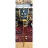 A black silk and gold thread embroidered banner, on brass-mounted three piece ash pole 7th Dragoon