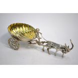 A late Victorian novelty parcel gilt silver shell salt, as a wheeled cart drawn by a goat and driven