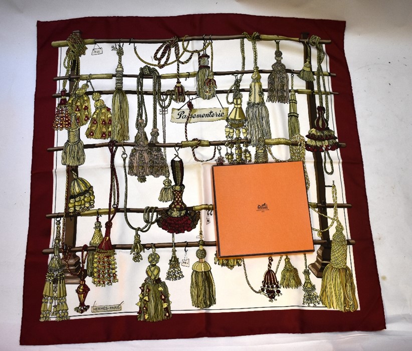 A boxed Hermes Passementerie (trimmings) silk scarf designed by Francoise Heron in 1960, deep red