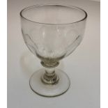 A Georgian wine glass, ovoid half fluted bowl, collar, short plain stem, conical base and rough