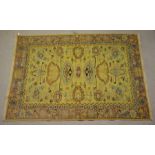 An old Afghan Sumak rug, yellow-gold field, approx 2.65 x 1.78 m
