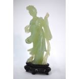 A bowenite, or other mottled green, figure of a standing Chinese Handmaiden, 19.5 cm highSome