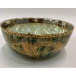 A large Wedgwood lustre bowl designed by Daisy Makeig-Jones, green/blue exterior decorated with