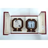 Must de Cartier, a two piece gilt and lacquer travel desk set comprising a strut clock and