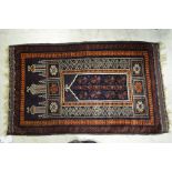 An Afghan Taimani 'Seh Mihrab' prayer rug, gold-brown ground circa 1920, 1.45 x .87 m [596]