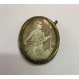 A large oval Victorian shell cameo brooch featuring classical scene, in gilt metal mount, 6 x 4.5