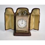 An Edwardian silver boudoir clock with Swiss movement and engine-turned and engraved 'dot'