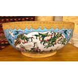 A large and impressive Chinese famille rose punch bowl, decorated with panels of Manchurian Cranes