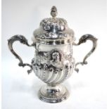 A George III Irish silver two-handled cup, embossed with floral garlands and wreaths flanking