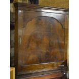 mahogany hanging corner cupboard with single panelled door