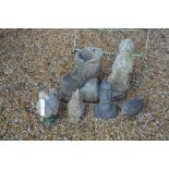 Six various weathered cast garden ornaments including a boot, duck, fish etc.
