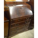 Mahogany cross banded fall front bureau with fitted interior over four drawers