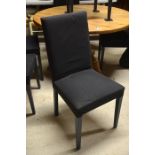 Six contemporary high back dining chairs with removable black covers and painted legs