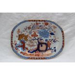 A Masons Ironstone dish of oval form decorated with flowers and leaves,