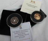 An Elizabeth II gold sovereign dated 2015 together with an Elizabeth II silver proof £1 coin dated