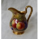 A Royal Worcester porcelain jug painted with peaches and black grapes to a naturalistic background,