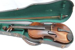 A French violin, with a two piece back and ebonised stringing,