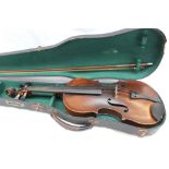 A French violin, with a two piece back and ebonised stringing,