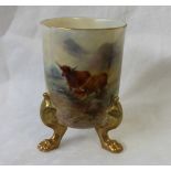 A Royal Worcester porcelain vase, of cylindrical form on three gilt legs,