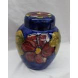 A Moorcroft pottery Ginger Jar and cover, decorated in the Clematis pattern to a blue ground,