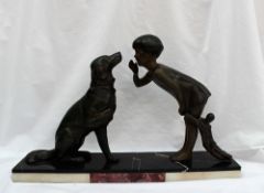 An Art Deco style spelter and marble figure group of a young girl with a doll whispering to a