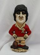 A John Hughes pottery Grogg of Gareth Davies in a red Wales jersey with a ball at his feet, No.