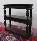 A 17th century and later oak three tier buffet,