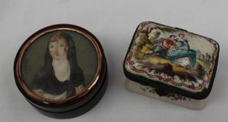 A faience snuff box, painted to the top with a loving couple in a landscape,