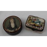 A faience snuff box, painted to the top with a loving couple in a landscape,