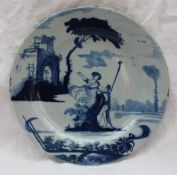 An 18th century Bristol Delft plate with blue painted decoration of a maiden in front of a ruin,