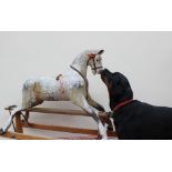 A 20th century Lines for Triang gesso covered rocking horse, on a static rocking base,