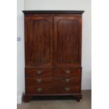 A 19th century mahogany linen press,