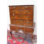 An 18th century and later oyster veneered chest on stand,
