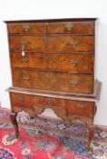 An 18th century and later oyster veneered chest on stand,