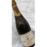 A bottle of Moet & Chandon dry imperial champagne 1975